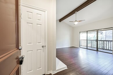 This photo features a bright living area with high