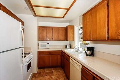Kitchen with greenhouse window, ceramic tile count