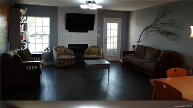 Beautiful brick accent around gas fireplace. Gorge