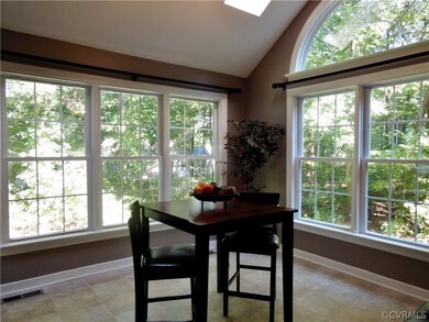 Vaulted Ceilings & New Replacement Windows.