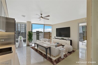  Veer 2609 E.  Living area featuring ceiling fan,