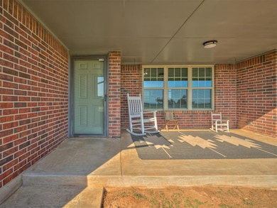 Entrance to property with brick siding