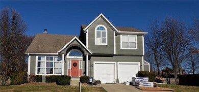 709 Meadow Ln, Raymore, MO 64083 - photo 2