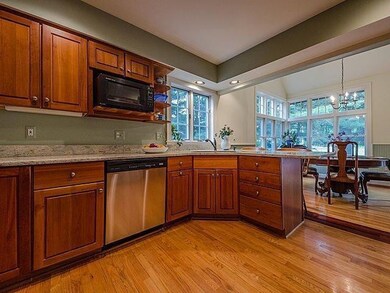 Kitchen with dining room beyond