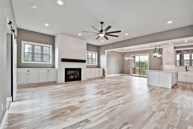Wide open and tons of natural light! Gorgeous wood floors throughout!