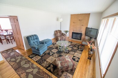 Living room has beautiful refinished oak hardwood 