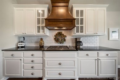 5-burner gas cooktop, display cabinets & crisp whi