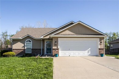 306 E Olive St, Raymore, MO 64083 - photo 2