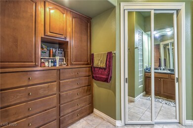 Primary Bathroom featuring vanity, tile patterned