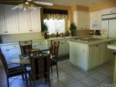 Family Kitchen with Center Island and Breakfast Ta