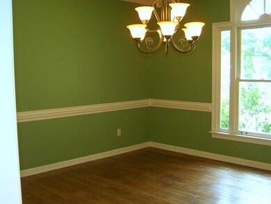 Updated lighting with hardwood floors