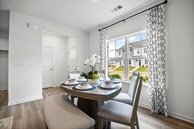 Dining space featuring wood finished floors