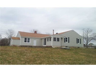 Exterior Back. Back yard View patio and sunroom