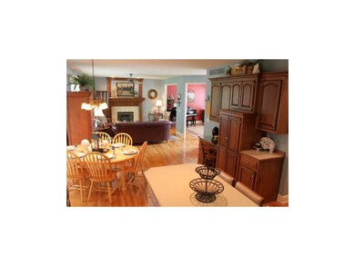 Open floor plan flows from family room to kitchen