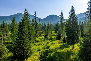 Looking east towards mountains and State land