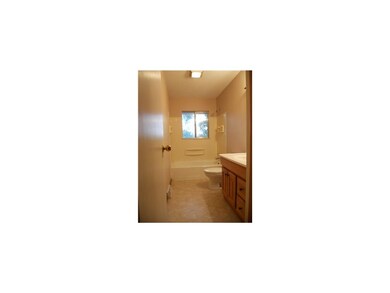 Bathroom. Main floor with new vinly floor and tup 