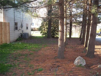 Exterior side of home next to driveway