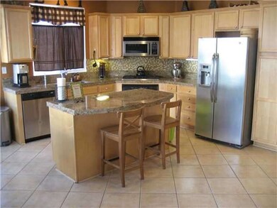 Entertainer's kitchen including granite countertop