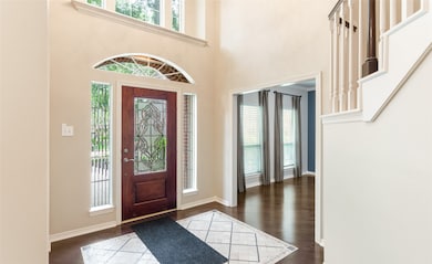 To the left of the front foyer is the formal study with french doors.