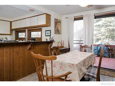 Kitchen Kitchen dining area has sliding glass door