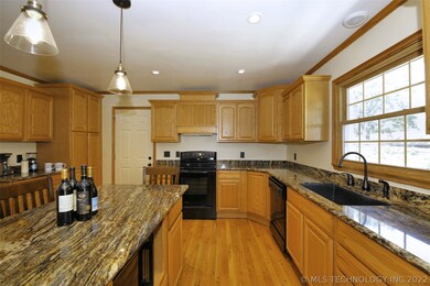 Exotic granite  graces this outstanding kitchen wi