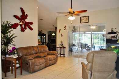 Family room looking out towards lanai & pool