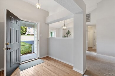 Entrance foyer with lofted ceiling