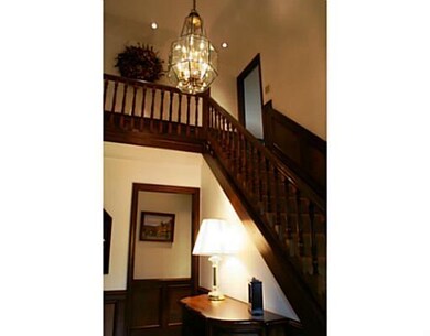 Entry/Foyer. What a Staircase...One Could Make Qui