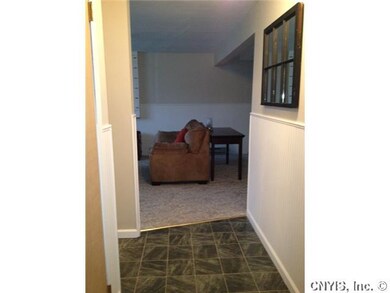 Foyer. There is a one car attached garage and a do