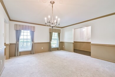 Expansive and sophisticated formal living area.