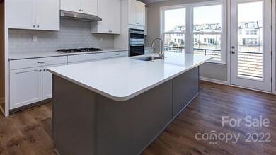 An abundance of cabinet space is offered in this g