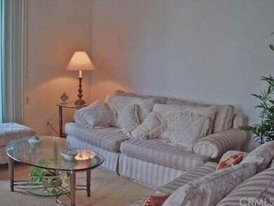 Spacious living room with fireplace.