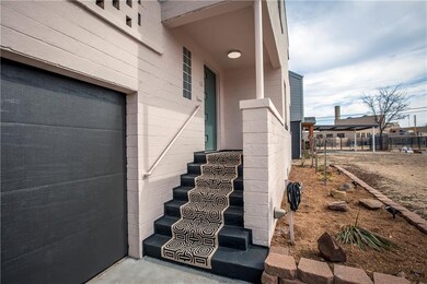 Designer stair-runner carpet and new, mid century modern front door.
