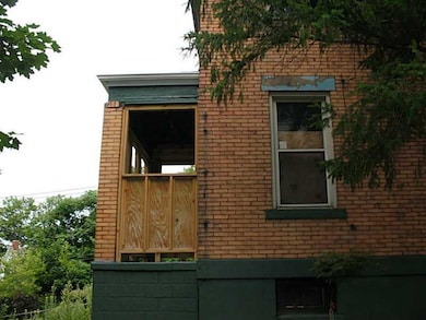 Exterior Back. Back porch has been newly framed wi