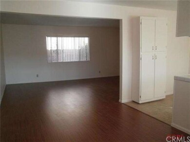 Dining area looking into living room.