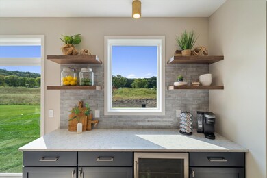 Wine or coffee bar in kitchen.   Pictures from different home.
