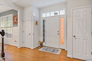 Entrance foyer featuring light hardwood / wood-sty