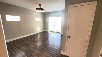 View of living/sleeping area from front entry.