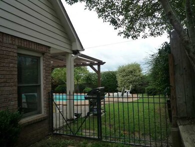 Wrought Iron Gate At Side of Home. WOW What A View