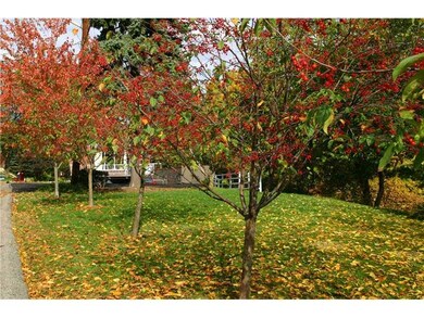 Exterior Front. Side yard looks onto the side deck