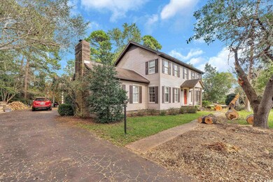 View of front of property featuring a front lawn