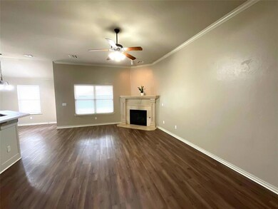 Unfurnished living room with dark hardwood / wood-