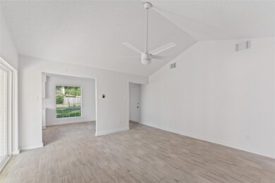 Bright and spacious living area with high ceilings