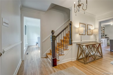 Stairway featuring ornamental molding, a notable c