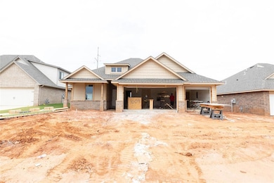 View of front of house featuring a shingled roof a