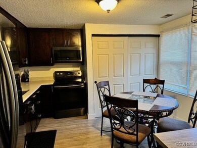 Dining room featuring light hardwood / wood-style
