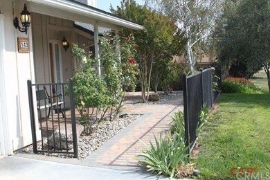 Attractive front entry iron gateway.