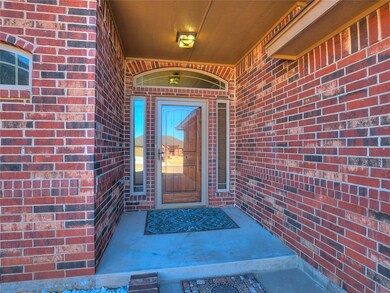 Detailed brick work welcomes you into open entry a