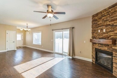 Light Bright Family Room with Slider to fenced pat