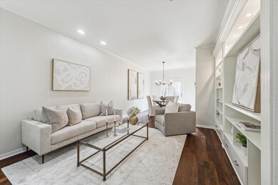 View walking into the open living room from the fr